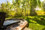 Enjoy the private hot tub with stunning views 